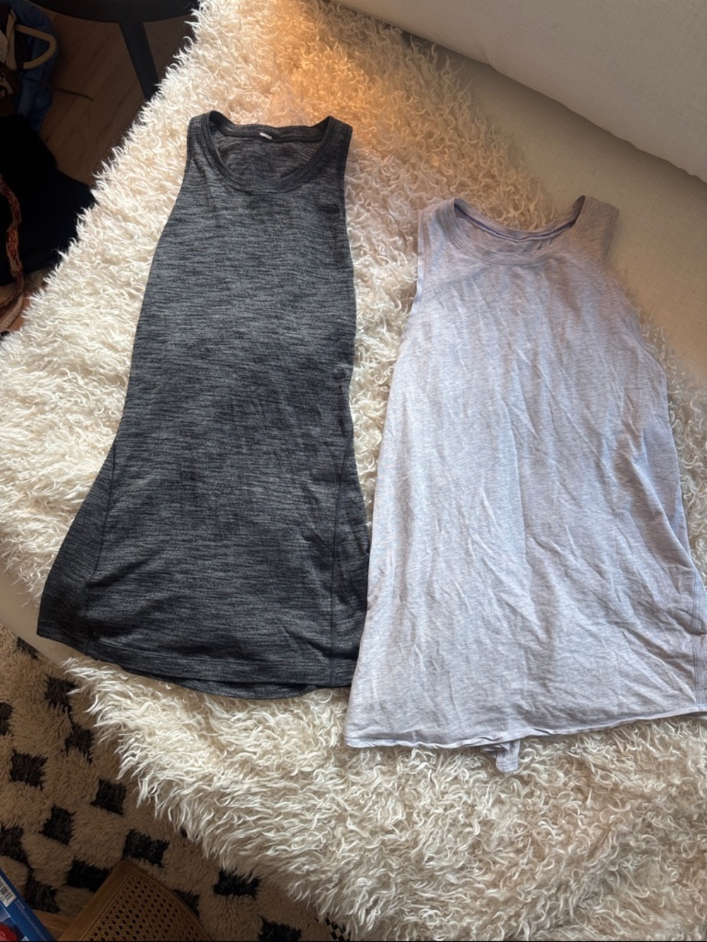Two lululemon tops. Both are size 6. Mint condition.